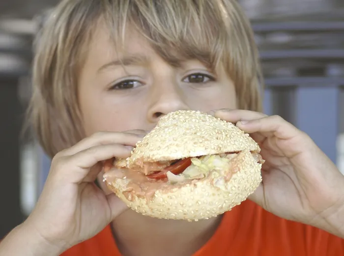 Framed Print : Boy Eats Burger Print Framed Print : Boy Eats Burger Print