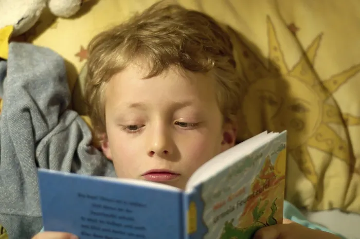 Framed Print : Boy Reading in Bed Print Framed Print : Boy Reading in Bed Print