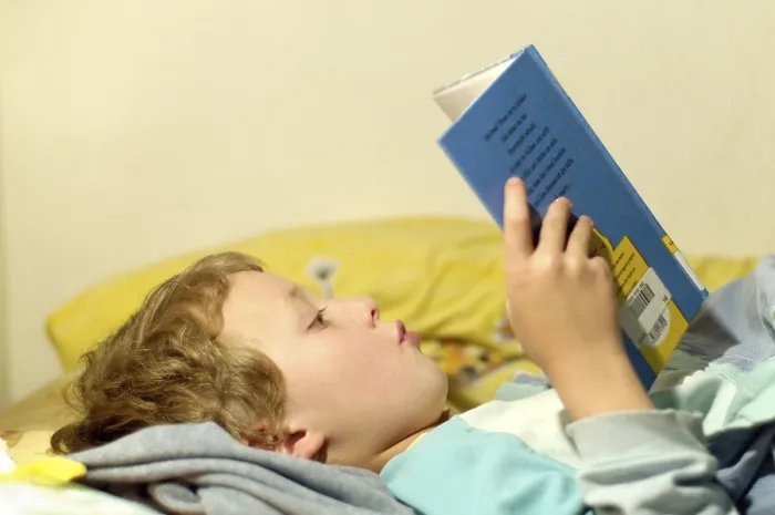 Framed Print : Boy Reading in Bed Print Framed Print : Boy Reading in Bed Print