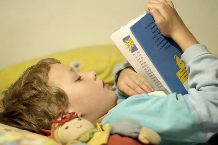 Framed Print : Boy Reading in Bed Print Framed Print : Boy Reading in Bed Print