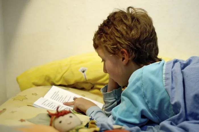 Framed Print : Boy Reading in Bed Print Framed Print : Boy Reading in Bed Print
