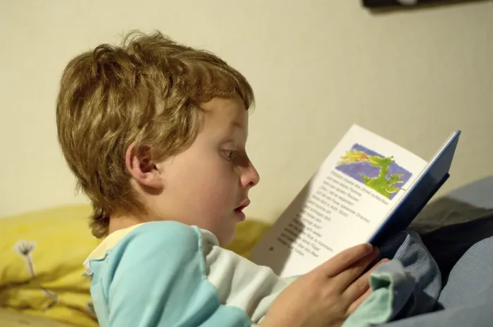 Framed Print : Boy Reading in Bed Print Framed Print : Boy Reading in Bed Print