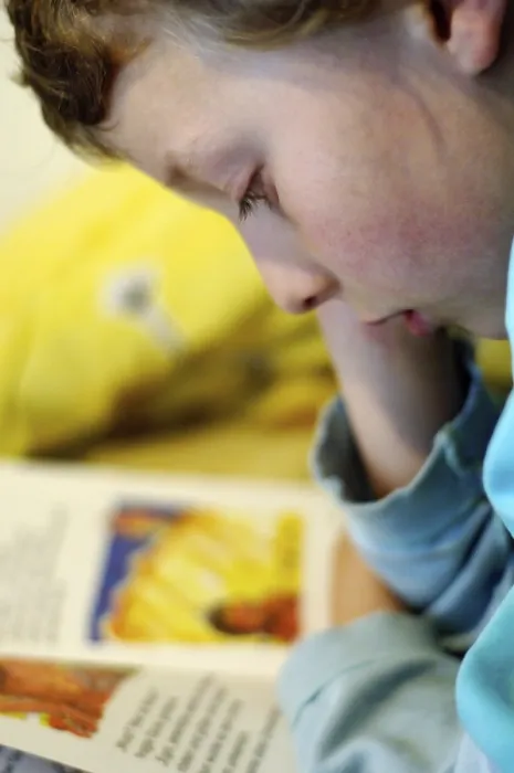 Framed Print : Boy Reading in Bed Print Framed Print : Boy Reading in Bed Print