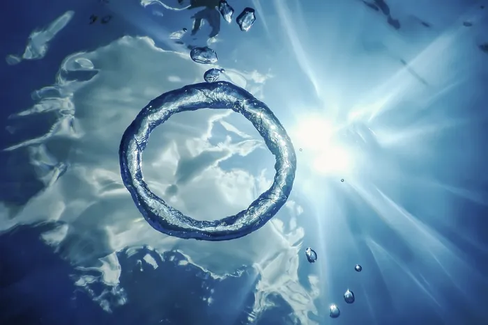 Framed Print : Bubble Ring Underwater Ascends towards the Sun Print