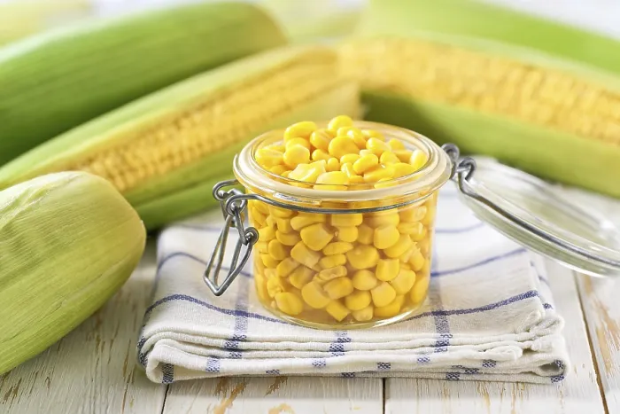Framed Print : Canned Sweet Corn Print on White Table Framed Print : Canned Sweet Corn Print on White Table
