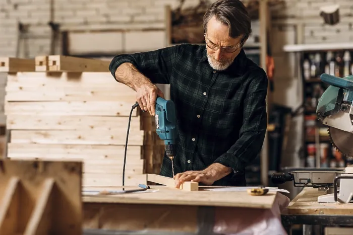 Framed Print : Carpenter Using Electric Drill Print Framed Print : Carpenter Using Electric Drill Print