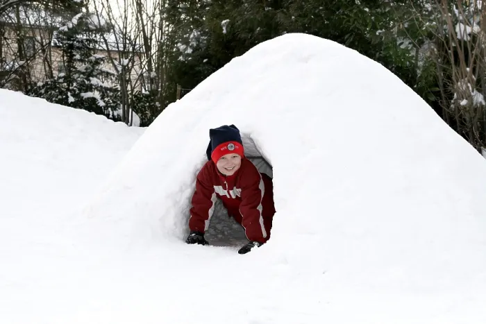 Framed Print : Child Plays in Igloo Print