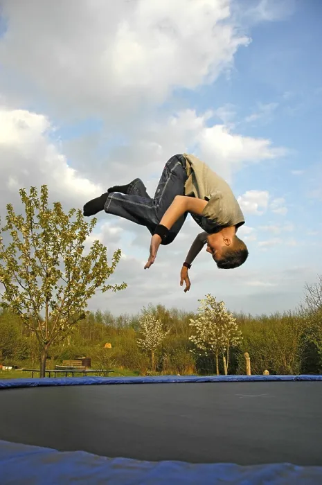 Framed Print : Child on Trampoline Print Framed Print : Child on Trampoline Print