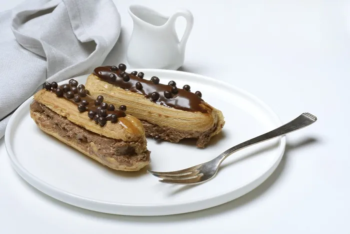Framed Print : Chocolate Eclairs Print on Plate Framed Print : Chocolate Eclairs Print on Plate