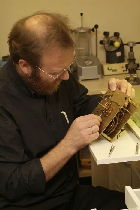 Framed Print : Clockmaker Restores Clock Print Framed Print : Clockmaker Restores Clock Print
