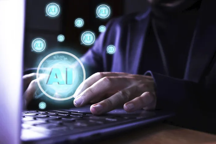 Framed Print : Close-up of Man Using Computer with AI Icons Print