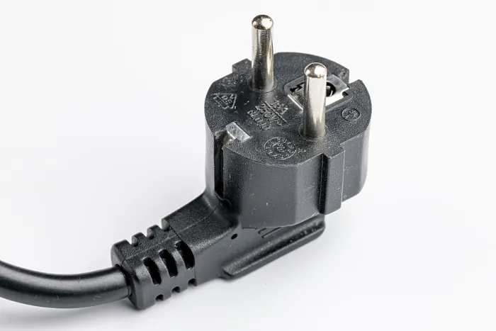 Framed Print : Close-up of a Schuko plug on white background Print