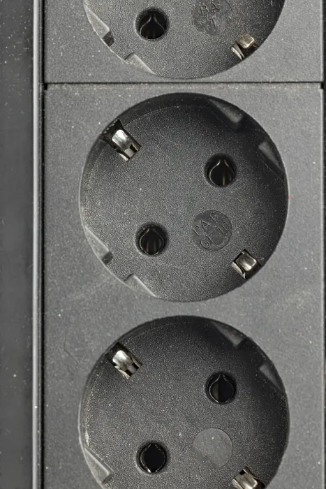 Framed Print : Close-up of sockets in a black socket strip Print Framed Print : Close-up of sockets in a black socket strip Print