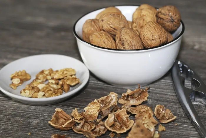Framed Print : Close-up Print of Walnuts on Table Framed Print : Close-up Print of Walnuts on Table