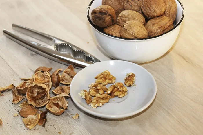 Framed Print : Walnuts on Table Print - Close-up