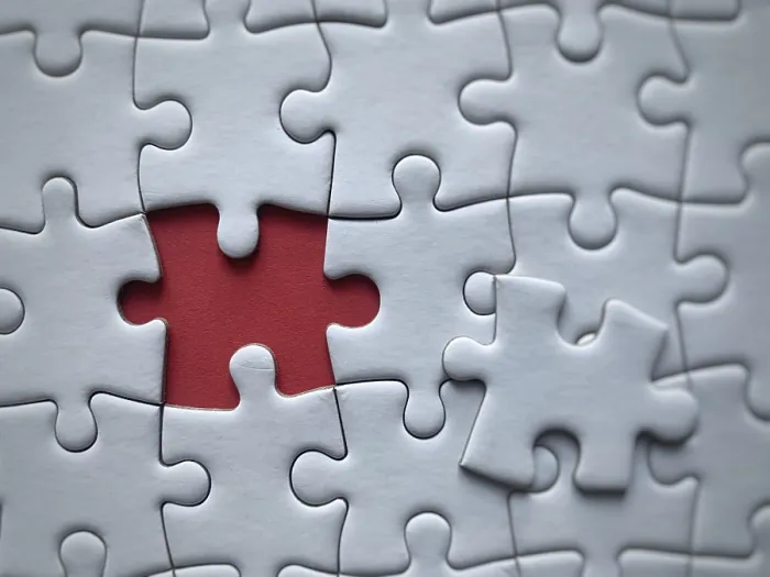 Framed Print : Closeup of a Puzzle Print with Missing Piece Framed Print : Closeup of a Puzzle Print with Missing Piece
