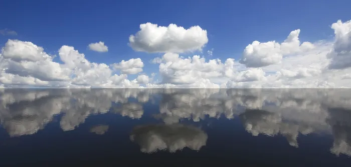 Framed Print : Clouds in the blue sky reflected in the water Print, Germany Framed Print : Clouds in the blue sky reflected in the water Print, Germany