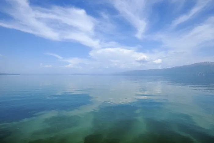 Framed Print : Clouds reflected in water surface Print, Lake Ohrid, Albania Framed Print : Clouds reflected in water surface Print, Lake Ohrid, Albania