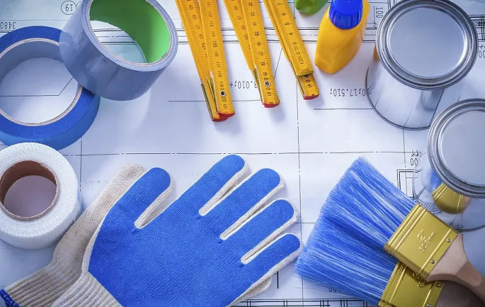 Framed Print : Composition of Working Paint Tools on Blueprint Construction Print Framed Print : Composition of Working Paint Tools on Blueprint Construction Print