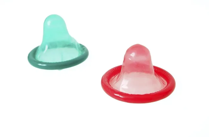 Framed Print : Condoms Print - Various Condoms on a Table Framed Print : Condoms Print - Various Condoms on a Table