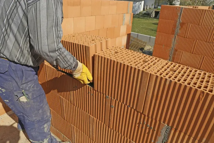 Framed Print : Construction Worker Bricklayer Print on Building Site Framed Print : Construction Worker Bricklayer Print on Building Site