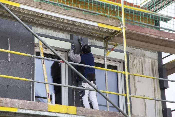 Framed Print : Construction Workers Insulate House Facade Print Framed Print : Construction Workers Insulate House Facade Print