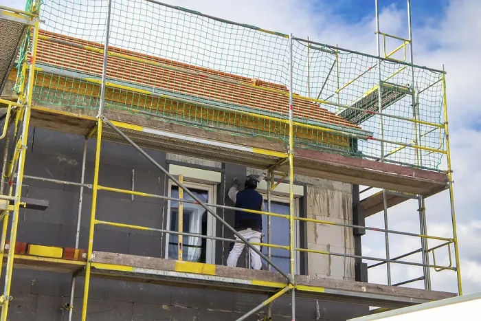 Framed Print : Construction Workers Insulate House Facade Print Framed Print : Construction Workers Insulate House Facade Print