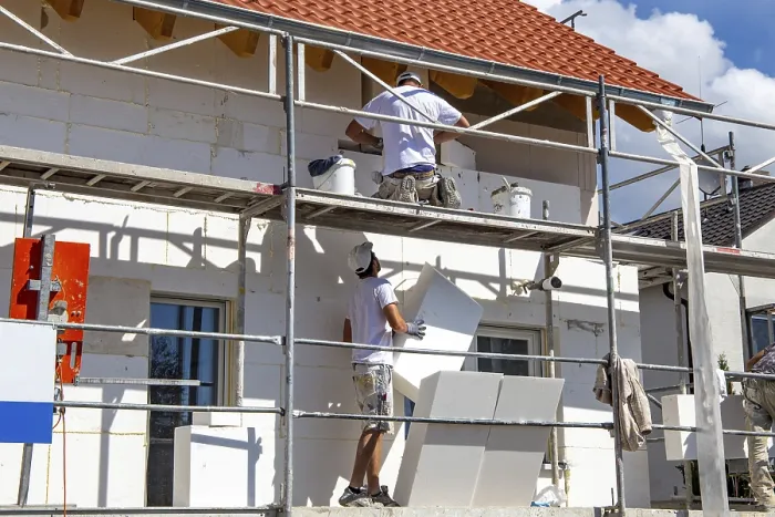 Framed Print : Construction Workers Insulate House Facade Print Framed Print : Construction Workers Insulate House Facade Print