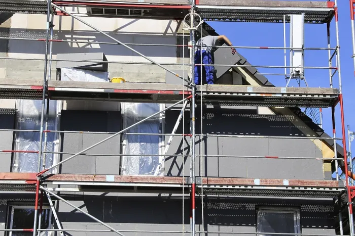 Framed Print : Construction Workers Insulate House Facade Print Framed Print : Construction Workers Insulate House Facade Print