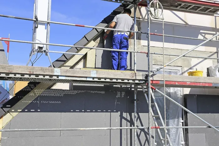 Framed Print : Construction Workers Insulate House Facade Print Framed Print : Construction Workers Insulate House Facade Print