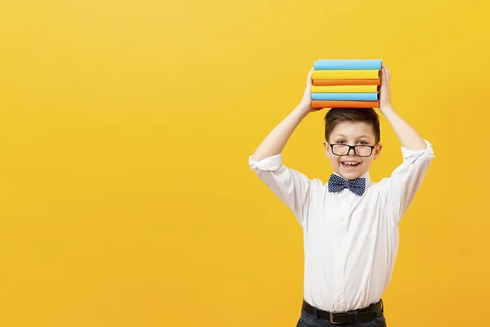 Framed Print : Copy Space Boy Holding Stack of Books Print Framed Print : Copy Space Boy Holding Stack of Books Print