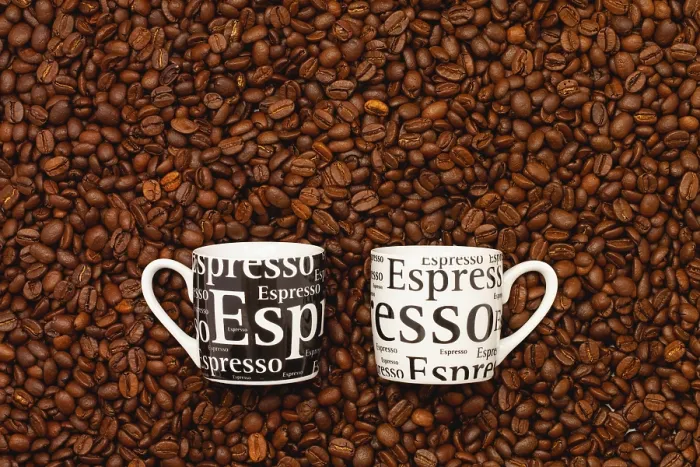 Framed Print : Coffee Print: Two Cups Amidst Coffee Beans Framed Print : Coffee Print: Two Cups Amidst Coffee Beans