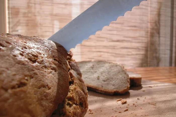 Framed Print : Cutting Bread Print Framed Print : Cutting Bread Print