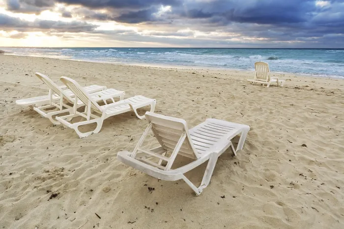 Framed Print : Deckchairs on a Beach Print with Ocean Background