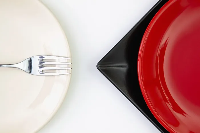 Framed Print : White Table Top View Print with Red, Black and Plates Framed Print : White Table Top View Print with Red, Black and Plates