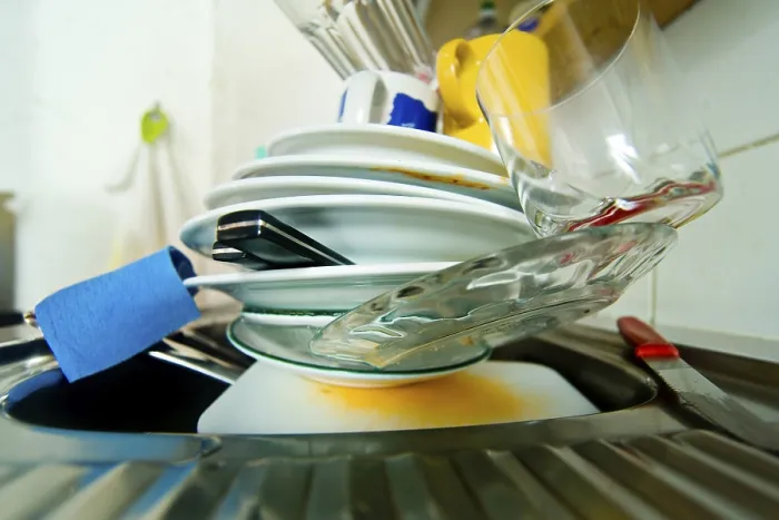 Framed Print : Dirty Tableware in a Kitchen Print