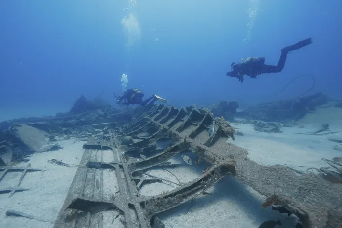 Framed Print : Divers Explore a Large Shipwreck on the Ocean Floor Print Framed Print : Divers Explore a Large Shipwreck on the Ocean Floor Print