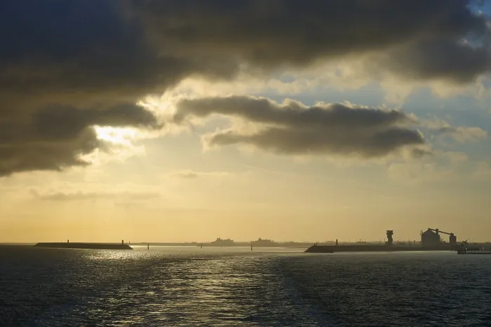Framed Print : Dramatic Clouds and Setting Sun Print, Calais Harbor, France