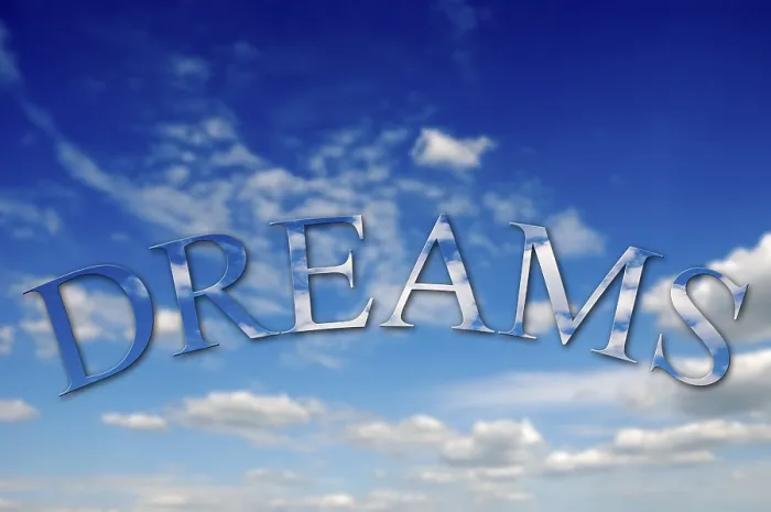 Framed Print : Dreams Text Print with Clouds Texture Against Sky Background Framed Print : Dreams Text Print with Clouds Texture Against Sky Background