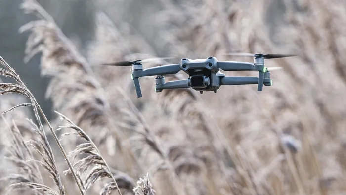 Framed Print : Drone in flight over marshland print, Devon, England Framed Print : Drone in flight over marshland print, Devon, England
