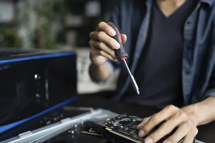 Framed Print : IT Engineer Installing Hardware Equipment in Print Framed Print : IT Engineer Installing Hardware Equipment in Print