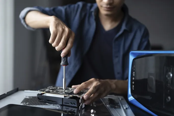 Framed Print : IT Engineer Installing Motherboard Print