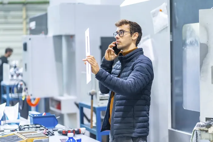 Framed Print : Engineer on Phone in CNC Factory Print Framed Print : Engineer on Phone in CNC Factory Print