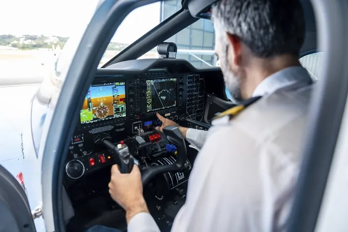 Framed Print : Experienced Pilot Checking Aircraft Instruments Print Framed Print : Experienced Pilot Checking Aircraft Instruments Print