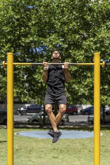 Framed Print : Fit Young Man Pull-up Print in Park Setting Framed Print : Fit Young Man Pull-up Print in Park Setting