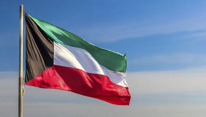 Framed Print : The Flag of Kuwait Print - Isolated Against a Blue Sky