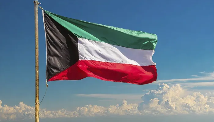 Framed Print : The Flag of Kuwait Print - Isolated Against a Blue Sky