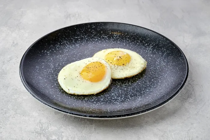 Framed Print : Two Fried Eggs Print on a Plate Framed Print : Two Fried Eggs Print on a Plate