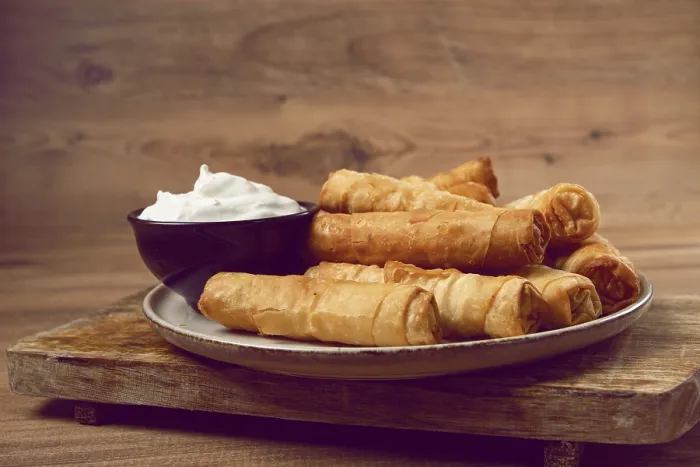 Framed Print : Fried Spring Rolls with Cheese Print on Wooden Background Framed Print : Fried Spring Rolls with Cheese Print on Wooden Background