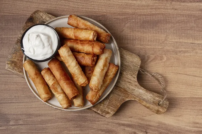 Framed Print : Fried Spring Rolls with Cheese Print on Wooden Background Framed Print : Fried Spring Rolls with Cheese Print on Wooden Background